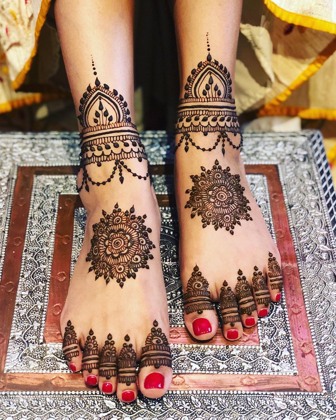 Indian bride showing feet mehndi design her wedding ceremony 31703271 Stock  Photo at Vecteezy